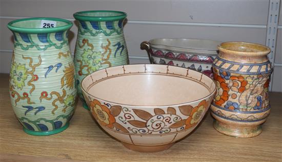 A pair of Crown Ducal vases decorated by Frederick Rhead, 22cm and three pots by Charlotte Rhead